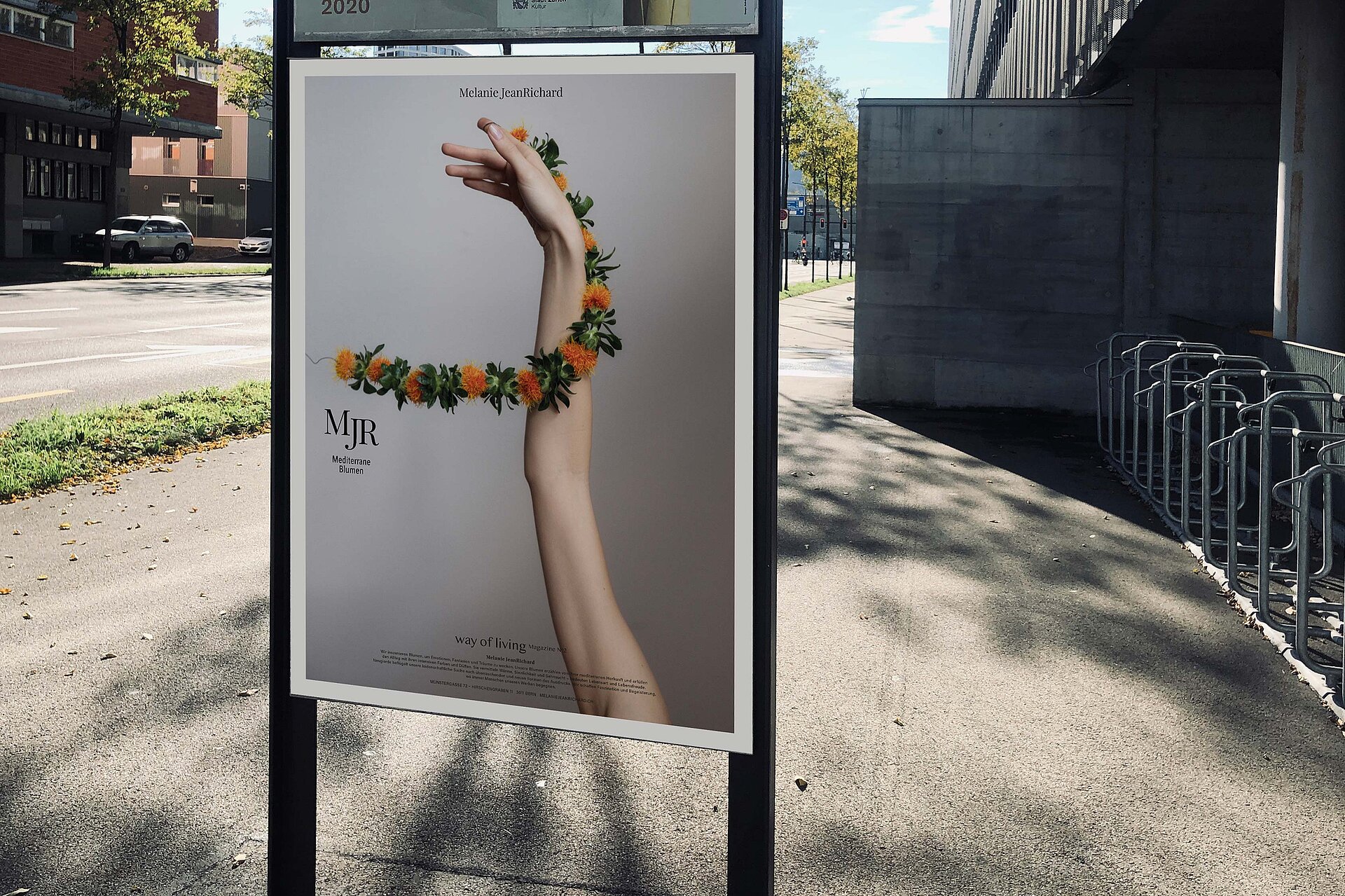 poster hand with flower wretch advertising bern